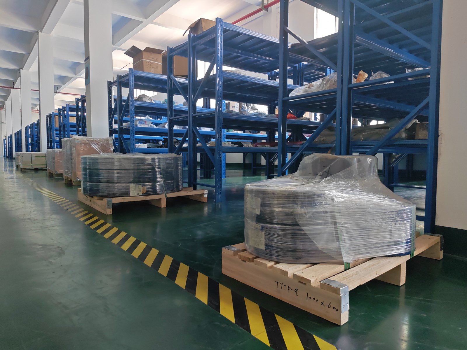 Warehouse stocked with drilling equipment components